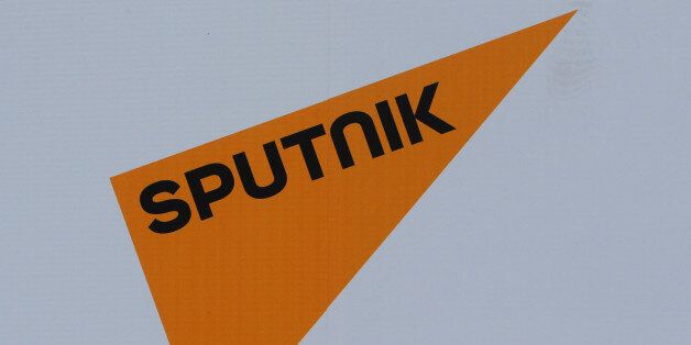 The logo of Russian state news agency Sputnik is seen on a board at the St. Petersburg International Economic Forum 2017 (SPIEF 2017) in St. Petersburg, Russia, June 1, 2017. Picture taken June 1, 2017. REUTERS/Sergei Karpukhin