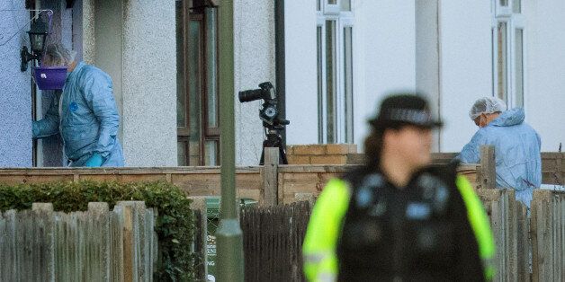 SUNBURY, ENGLAND - SEPTEMBER 16: Forensics officers investigate a property on Cavendish Road during a raid in connection with the terror attack at Parsons Green station on September 16, 2017 in Sunbury, England. An 18-year-old man has been arrested in Dover in connection with yesterday's terror attack on Parsons Green station in which 30 people were injured. The UK terror threat level has been raised to 'critical'.(Photo by Jack Taylor/Getty Images)
