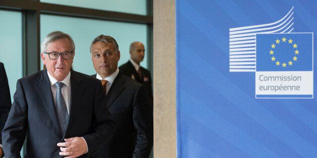 Brussels, Belgium, September 3, 2015. -- President of the EU Commission Jean Claude Juncker (L) and the Hungarian Prime Minister (Fidesz â Magyar PolgÃ¡ri SzÃ¶vetsÃ©g) Viktor OrbÃ¡n (R) pose prior to a meeting at the European Commission. (Photo by Thierry Tronnel/Corbis via Getty Images)