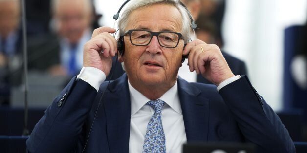 European Commission President Jean-Claude Juncker adjusts headphones before delivers his State of the Union speech at the European Parliament in Strasbourg, eastern France, on September 13, 2017. / AFP PHOTO / PATRICK HERTZOG (Photo credit should read PATRICK HERTZOG/AFP/Getty Images)