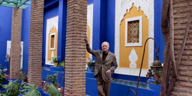 Co-founder of Yves Saint Laurent (YSL) Couture House and YSL's lifelong partner Pierre Berge poses in the Majorelle garden in Marrakesh November 26, 2010. Pierre Berge was in Marrakesh to open the