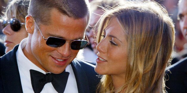 Actor Brad Pitt and his actress wife Jennifer Aniston arrive at the 56th annual Primetime Emmy Awards at the Shrine Auditorium in Los Angeles, September 19, 2004. HBO led the nominations with its highest-ever total, 124. NBC was second with 65, followed by CBS with 44, ABC with 33 and Fox with 31. PBS earned 27 nominations. The awards are given by the Academy of Television Arts & Sciences. REUTERS/Kimberly White PP05080099 FG