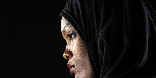 Profile Headshot of a sad african muslim woman