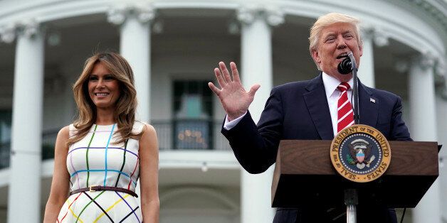 U.S. President Donald Trump delivers remarks as he hosts a Congressional picnic event, accompanied by First Lady Melania Trump, at the White House in Washington, U.S., June 22, 2017. REUTERS/Carlos Barria