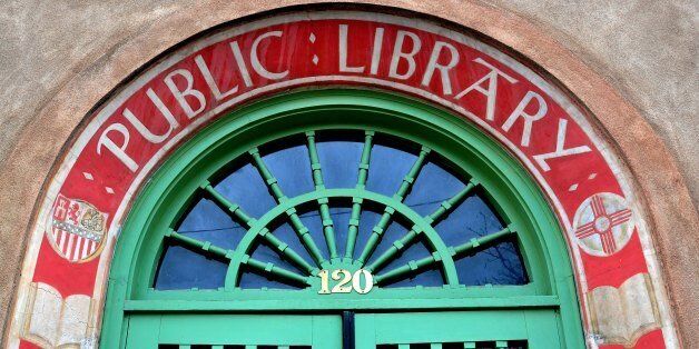 SANTA FE, NM - NOVEMBER 26, 2012: The arched entrance to the former public library in Santa Fe, New Mexico, now used as state government offices. (Photo by Robert Alexander/Getty Images)
