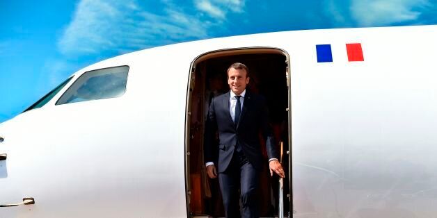 French President Emmanuel Macron disembarks from the airplane upon his arrival on August 23, 2017 at the airport in Salzbourg. / AFP PHOTO / POOL / BERTRAND GUAY (Photo credit should read BERTRAND GUAY/AFP/Getty Images)