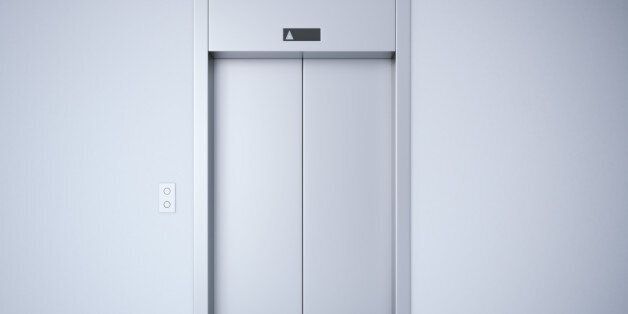 Modern elevator with closed metal doors. 3d rendering