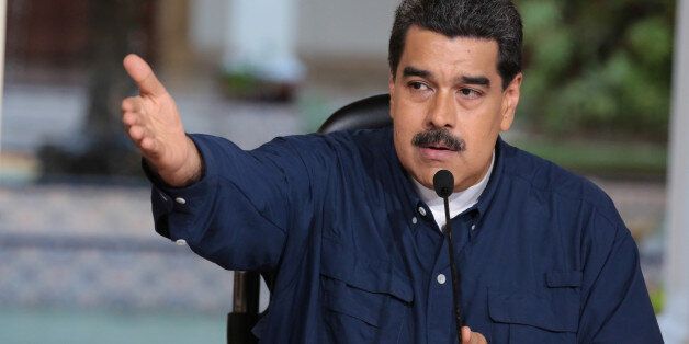Venezuela's President Nicolas Maduro speaks during a meeting at Miraflores Palace in Caracas, Venezuela August 25, 2017. Miraflores Palace/Handout via REUTERS ATTENTION EDITORS - THIS PICTURE WAS PROVIDED BY A THIRD PARTY.