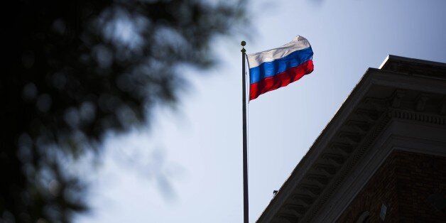 SAN FRANCISCO, USA - AUGUST 31 : A Russian flag waves on top of Consulate General Of The Russian Federation building as the consulate readies itself for closure in San Francisco, United States on August 31, 2017. The Trump administration ordered Russia to close it's consulate in San Francisco, and two annexes in New York and Washington in response to a Russian order that the United States cut it's diplomatic staff in Moscow. (Photo by Philip Pacheco/Anadolu Agency/Getty Images)