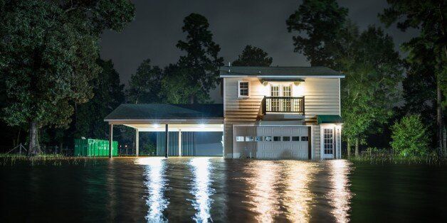 HOUSTON, USA - AUGUST 29: A home underwater after Hurricane Harvey at Porter in Houston, Texas of United States on August 29, 2017. (Photo by Tharindu Nallaperuma/Anadolu Agency/Getty Images)