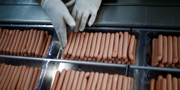 Workers work in sausages production section in Akova Impex Meat Industry Ovako, which makes halal quality certified products, in Sarajevo, Bosnia and Herzegovina, December 2, 2016. Picture taken December 2, 2016. REUTERS/Dado Ruvic