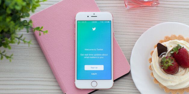 Alushta, Russia - October 25, 2015: iPhone6S Rose Gold with app Twitter on the table. iPhone 6S Rose Gold was created and developed by the Apple inc.