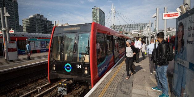 A Docklands Light Railway (DLR) arrives at Poplar station in London, U.K., on Monday, Aug. 14, 2017. The Docklands Light Railway, a low-capacity rail system connecting the City of London to the Docklands area that carries 122 million passengers a year, began operating on Aug. 31, 1987. Photographer: Simon Dawson/Bloomberg via Getty Images