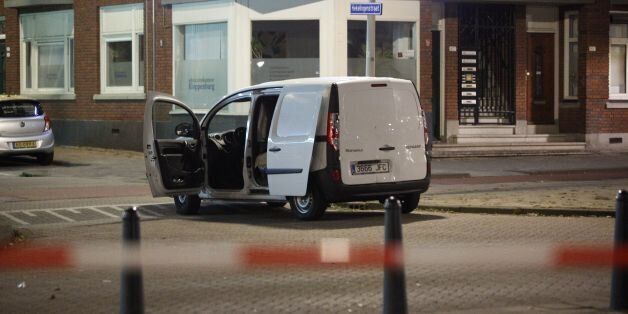 A van with a Spanish numberplate near the concert venue Maassilo is seen during police investigations after a rock concert was cancelled due to a terror threat, in Rotterdam, The Netherlands, on August 23, 2017. A rock concert in Rotterdam was cancelled on August 23 due to a terror threat involving a Spanish van found with gas bottles inside, the local mayor said. Earlier the Maassilo venue announced that 'due to a terrorist threat, the Allah-Las concert will not take place this evening, on police orders'. Rotterdam police confirmed the decision was taken due to a 'possible terrorist threat' and that the van's driver had been arrested. / AFP PHOTO / ANP / Arie Kievit / Netherlands OUT (Photo credit should read ARIE KIEVIT/AFP/Getty Images)