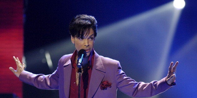 Singer Prince performs in a surprise appearance on the