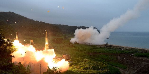 EAST COAST, SOUTH KOREA - JULY 29: In this handout photo released by the South Korean Defense Ministry, U.S. Army Tactical Missile System (ATACMS) and South Korea's missile system firing Hyunmu-2 firing a missile into the East Sea during a South Korea-U.S. joint missile drill aimed to counter North KoreaÂ¡Â¯s ICBM test on July 29, 2017 in East Coast, South Korea. North Korea launched another test missile, believed to be an Inter Continental Ballistic Missile (ICBM), which travelled 45 minu