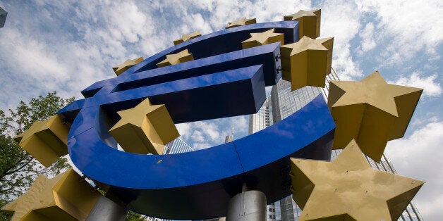 Euro symbol in front of European Central Bank Headquarters, in Willy Brandt Platz, Frankfurt, Germany, 07 August 2014. In a press conference after ECB's board meeting, ECB president Mario Draghi announced that the ECB maintains its key interest rate at its record low of 0.15 percent in spite of the peril of very low inflation in Eurozone, and the geopolitical danger caused by the Ukraine crisis and crossed sanctions between the European Union and Russia. (Photo by Horacio Villalobos/Corbis via G