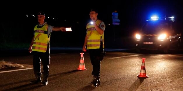 Police officers direct traffic on a road near the site where man smashed a car into a pizza restaurant in Sept-Sorts, 55km east of Paris, on August 14, 2017, killing a 13-year-old girl and seriously injuring four.Investigators said the young driver had tried to commit suicide and the incident was not terror-related. The man, who was arrested, said 'he had tried to kill himself yesterday (August 13) without success and decided to try again this way,' a source close to the inquiry said. / AFP PHOTO / Thomas Samson (Photo credit should read THOMAS SAMSON/AFP/Getty Images)