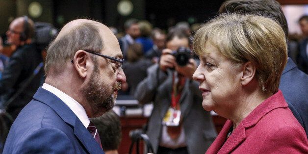European Parliament President Martin Schulz (L) and German Chancellor Angela Merkel attend a European Union leaders summit in Brussels, Belgium, March 17, 2016. Picture taken on March 17, 2016. REUTERS/Yves Herman/File Photo