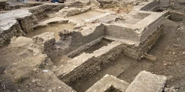 Archaeologists from Inrap (French National Institute for Preventive Archaeological Research) excavate mosaics at an archaeological site from the Gallo-Roman era, on July 11, 2017 in Auch. / AFP PHOTO / Eric CABANIS (Photo credit should read ERIC CABANIS/AFP/Getty Images)