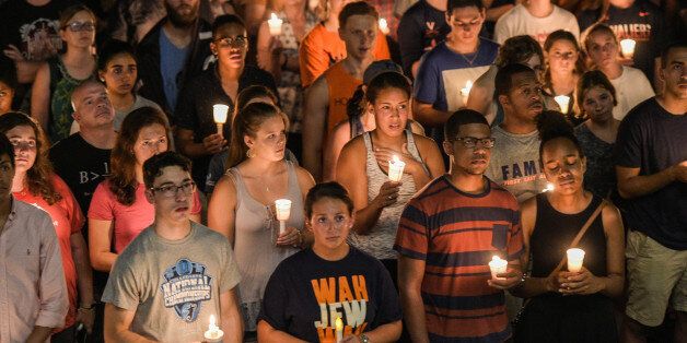 CHARLOTTESVILLE, VA - AUGUST 16: Hundreds of people march peacefully with lit candles across the University of Virginia campus on Wednesday, August 116, 2017, in Charlottesville, VA, in the wake of violence in the city and against torch-lit white nationalist parade the same campus last Friday night. (Photo by Salwan Georges/The Washington Post via Getty Images)