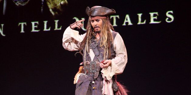 ANAHEIM, CA - AUGUST 15: Actor Johnny Depp, dressed as Captain Jack Sparrow, of PIRATES OF THE CARIBBEAN: DEAD MEN TELL NO TALES took part today in 'Worlds, Galaxies, and Universes: Live Action at The Walt Disney Studios' presentation at Disney's D23 EXPO 2015 in Anaheim, Calif. (Photo by Jesse Grant/Getty Images for Disney)