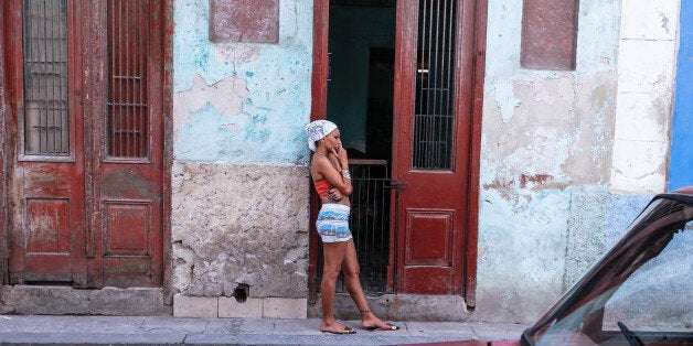 A young lady seen near her house entrance in Havana city center. For a week I explored the streets of Havana, the homes and Havana's vastly diverse culture, just a few days after the death of the legendary leader Fidel Castro. After news broke on Friday evening (the 25th November) that Fidel Castro had died, some people in Havana reacted in shock, disbelief, and pain. Others saw the former leader's death as an opportunity for the country.On the same night, many people did not respond with any visible emotion when they were told of Fidel Castros death. During the next few days that followed, many went about their days as usual, arguing that little would change because of Fidel Castros demise.Much of Havana seemed and still seems uncertain about exactly how to feel, or at least how to talk about it.On Friday, 2 December 2016, in Havana, Cuba. (Photo by Artur Widak/NurPhoto via Getty Images)