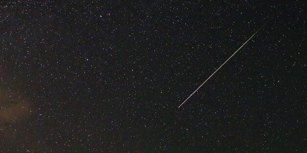 A meteor streaks across the sky during the Perseid meteor shower near Kraljevine on mountain Smetovi in the early morning August 12, 2015. The annual Perseid meteor shower reaches its peak on August 12 and 13 in Europe, according to NASA. REUTERS/Dado Ruvic