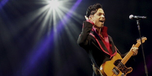 U.S. musician Prince performs on stage at Yas Arena in Yas Island, Abu Dhabi, United Arab Emirates November 14, 2010. REUTERS/Jumana El-Heloueh/File Photo