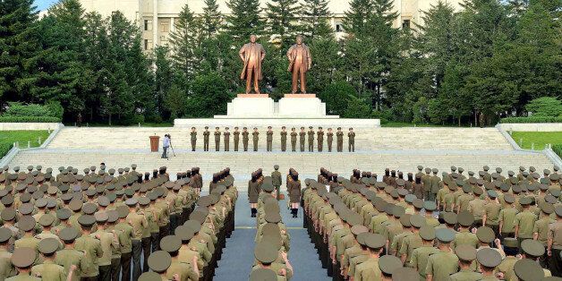 This picture taken on August 10, 2017 and released by North Korea's official Korean Central News Agency (KCNA) on August 11, 2017 shows service personnel of the Ministry of People's Security at a rally in support of North Korea's stance against the US, in Pyongyang. / AFP PHOTO / KCNA VIA KNS / STR / South Korea OUT / REPUBLIC OF KOREA OUT ---EDITORS NOTE--- RESTRICTED TO EDITORIAL USE - MANDATORY CREDIT 'AFP PHOTO/KCNA VIA KNS' - NO MARKETING NO ADVERTISING CAMPAIGNS - DISTRIBUTED AS A SERVICE TO CLIENTSTHIS PICTURE WAS MADE AVAILABLE BY A THIRD PARTY. AFP CAN NOT INDEPENDENTLY VERIFY THE AUTHENTICITY, LOCATION, DATE AND CONTENT OF THIS IMAGE. THIS PHOTO IS DISTRIBUTED EXACTLY AS RECEIVED BY AFP. / (Photo credit should read STR/AFP/Getty Images)