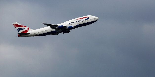 A passenger aircraft, operated by British Airways, a unit of International Consolidated Airlines Group SA (IAG), takes off from London Heathrow Airport, in London, U.K., on Tuesday, May 30, 2017. British Airways'Â epic meltdown over a busy holiday weekend further fanned public outrage of an industry infamous for its focus on cost cuts over customer service, leaving the U.K. carrier scrambling to explain how a local computer outage could lead to thousands of stranded passengers. Photographer: Luke MacGregor/Bloomberg via Getty Images