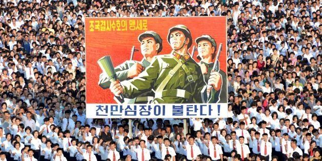 This picture taken on August 9, 2017 and released by North Korea's official Korean Central News Agency (KCNA) on August 10, 2017 shows a rally in support of North Korea's stance against the US, on Kim Il-Sung square in Pyongyang.North Korea on August 10 said US President Donald Trump was 'bereft of reason' and would only respond to force, as it elaborated on a threat to attack the US Pacific territory of Guam. / AFP PHOTO / KCNA VIA KNS / STR / South Korea OUT / REPUBLIC OF KOREA OUT ---EDITORS NOTE--- RESTRICTED TO EDITORIAL USE - MANDATORY CREDIT 'AFP PHOTO/KCNA VIA KNS' - NO MARKETING NO ADVERTISING CAMPAIGNS - DISTRIBUTED AS A SERVICE TO CLIENTSTHIS PICTURE WAS MADE AVAILABLE BY A THIRD PARTY. AFP CAN NOT INDEPENDENTLY VERIFY THE AUTHENTICITY, LOCATION, DATE AND CONTENT OF THIS IMAGE. THIS PHOTO IS DISTRIBUTED EXACTLY AS RECEIVED BY AFP. / (Photo credit should read STR/AFP/Getty Images)