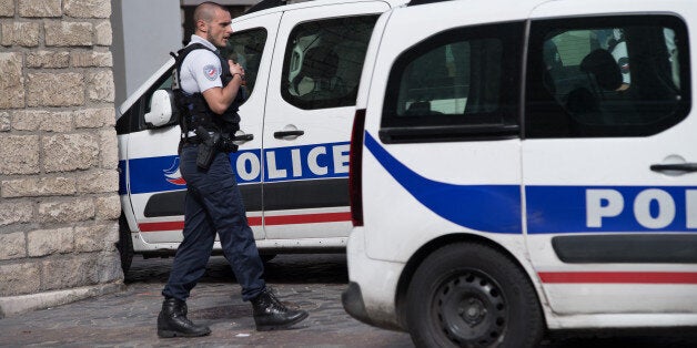 Police gather at the site where a car slammed into soldiers on patrol in Levallois-Perret, outside Paris, on August 9, 2017. (Photo by Julien Mattia/NurPhoto via Getty Images)