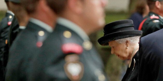 Britain's Queen Elizabeth passes members of the Second Battalion, Princess Patricia's Canadian Light Infantry (2PPCLI), as she arrives to attend the funeral service of Patricia Knatchbull, the Countess Mountbatten of Burma, at St Paul's Church in Knightsbridge, London, Britain June 27, 2017. REUTERS/Matt Dunham/Pool