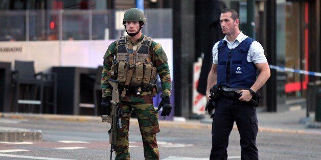 BRUSSELS, BELGIUM - JUNE 20 : Armed soldiers and police officers stand guard outside of the Brussels Central Station after a neutralized terrorist attack attempt, in Brussels, Belgium, 20 June 2017. (Photo by Dursun Aydemir/Anadolu Agency/Getty Images)
