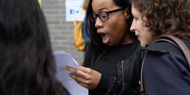 LONDON, ENGLAND - AUGUST 17: Students react as they receive their A level results at City and Islington College on August 17, 2017 in London, England. The number of students receiving the highest grades of A and A* grades has increased for the first time in six years. (Photo by Leon Neal/Getty Images)