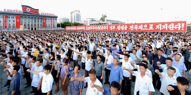 People participate in a Pyongyang city mass rally held at Kim Il Sung Square on August 9, 2017, to fully support the statement of the Democratic People's Republic of Korea (DPRK) government in this photo released on August 10, 2017 by North Korea's Korean Central News Agency (KCNA) in Pyongyang. KCNA/via REUTERS ATTENTION EDITORS - THIS IMAGE WAS PROVIDED BY A THIRD PARTY. REUTERS IS UNABLE TO INDEPENDENTLY VERIFY THIS IMAGE. NO THIRD PARTY SALES. SOUTH KOREA OUT. NO COMMERCIAL OR EDITORIAL SALES IN SOUTH KOREA.?