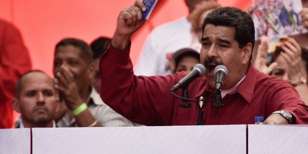 CARACAS, VENEZUELA - AUGUST 14: Venezuela's President Nicolas Maduro (R) speaks during a rally supporting him and opposing U.S. President Donald Trump, in Caracas, on August 14, 2017. (Photo by Carlos Becerra/Anadolu Agency/Getty Images)