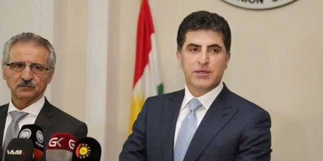ERBIL, IRAQ - AUGUST 8: Kurdish Regional Government (KRG) Prime Minister Nechirvan Barzani (R) and Mela Bahtiyar (L) who is in charge of Politburo of Patriotic Union of Kurdistan hold a press conference following their meeting in Erbil, Iraq on August 8, 2017. (Photo by Yunus Keles/Anadolu Agency/Getty Images)