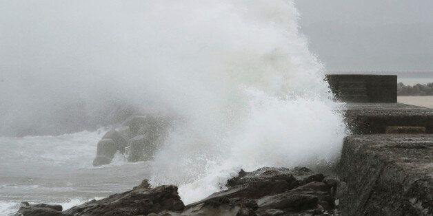 A wave, caused by Typhoon Noru, splashes the coast in Kushima, Miyazaki prefecture, Japan, August 6, 2017 in this photo taken by Kyodo. Mandatory credit Kyodo/via REUTERS ATTENTION EDITORS - THIS IMAGE WAS PROVIDED BY A THIRD PARTY. MANDATORY CREDIT. JAPAN OUT. NO COMMERCIAL OR EDITORIAL SALES IN JAPAN.