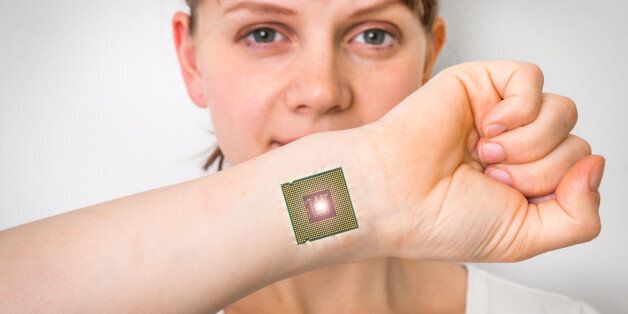Bionic chip (processor) implant in female human body - future technology and cybernetics concept