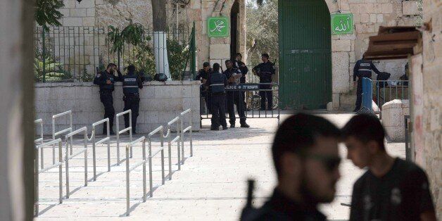 JERUSALEM - JULY 25: Israeli forces take security measures at the gates of Al Aqsa Mosque, after Israeli authorities decided to remove metal detectors from Al-Aqsa Mosque Compound in Jerusalem on July 25, 2017. Installation of metal detectors on gates of Al-Aqsa Mosque have been a major issue for the past few weeks which followed constant demonstrations by Palestinians. (Photo by Mahmoud brahem/Anadolu Agency/Getty Images)