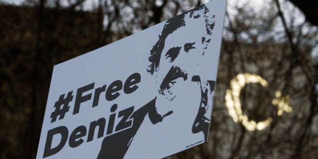 BERLIN, GERMANY - FEBRUARY 28: Protesters gather outside the Turkish Embassy to demand the release of German journalist Deniz Yucel on February 28, 2017 in Berlin, Germany. Yucel, who has both German and Turkish citizenship, is a correspondent for the German newspaper Die Welt and was arrested by Turkish authorities about two weeks ago. They accuse him of promoting propaganda for Kurdish separatists. Approximately 150 journalists are currently in prison in Turkey. (Photo by Michele Tantussi/Getty Images)