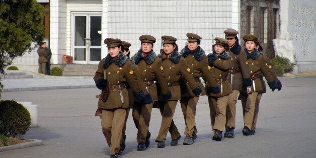 'PYONGYANG, Korea, North - MARCH 23, 2010: North Korean war woman squad in preparation for military parade'