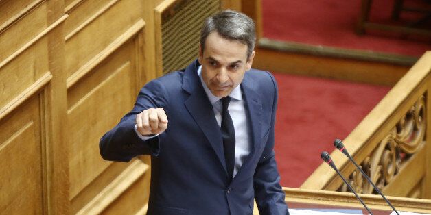 Kyriakos Mitsotakis, New Democracy main opposition leader addresses lawmakers during a discussion on the economy at Parliament, in Athens on July 3,2017 (Photo by Panayotis Tzamaros/NurPhoto via Getty Images)