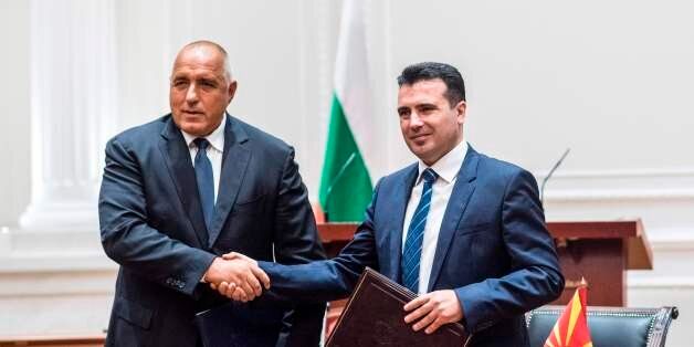 Bulgarian Prime Minister Boyko Borisov (L) and Macedonian Prime Minister Zoran Zaev (R) shake hands during...