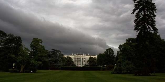 The White House is seen under dark rain clouds in Washington, DC, on June 1, 2015. The national weather forecast calls for severe weather for much of the US, including heavy rain from Washington, DC to Boston. AFP PHOTO/ANDREW CABALLERO-REYNOLDS (Photo credit should read Andrew Caballero-Reynolds/AFP/Getty Images)