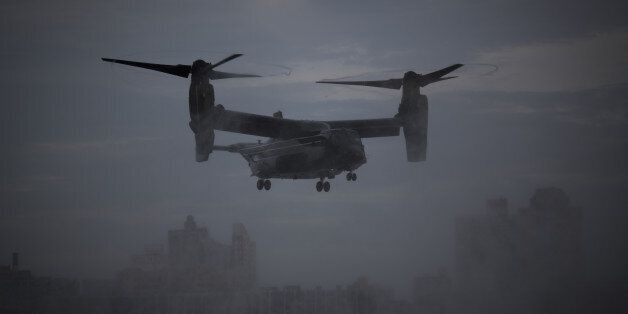 A United States Marine MV-22 Osprey helicopter hovers as U.S. President Barack Obama arrives in Marine One, not pictured, ahead of the General Assembly at the United Nations (UN) headquarters in New York, U.S., on Sunday, Sept. 18, 2016. Obama will address the 71st UN General Assembly Tuesday in his last major appearance at the gathering of world leaders. Photographer: John Taggart/Bloomberg via Getty Images