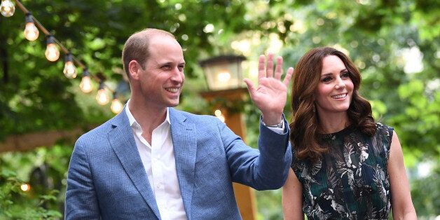 Britain's Prince William, the Duke of Cambridge and his wife Princess Kate, the Duchess of Cambridge, attend a reception at Claerchens Ballhaus, in Berlin Germany, July 20, 2017. REUTERS/Britta Pedersen/POOL