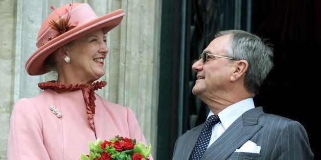 Danish Queen Margrethe smiles to her husband Prince Consort Henrikduring an appearance on the balcony of Brussels' Town Hall on May 28,2002. The Danish Royal couple is on a three-day official visit inBelgium. REUTERS/Francois Lenoir REUTERSTHR/AS